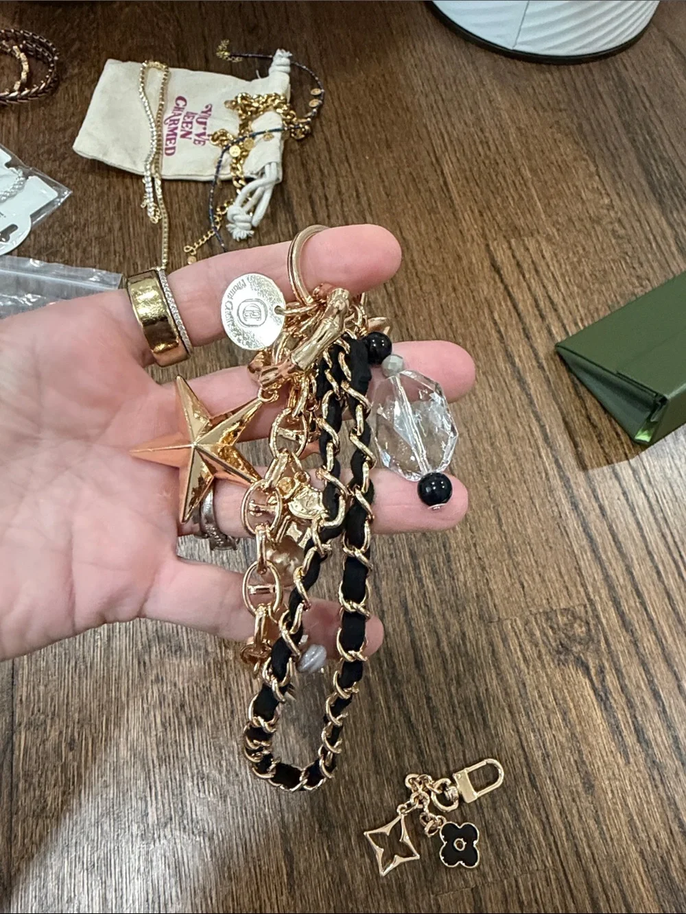 Set of 2 bag charms- Gold and Black Charm Keychain with Star & Flower Accents